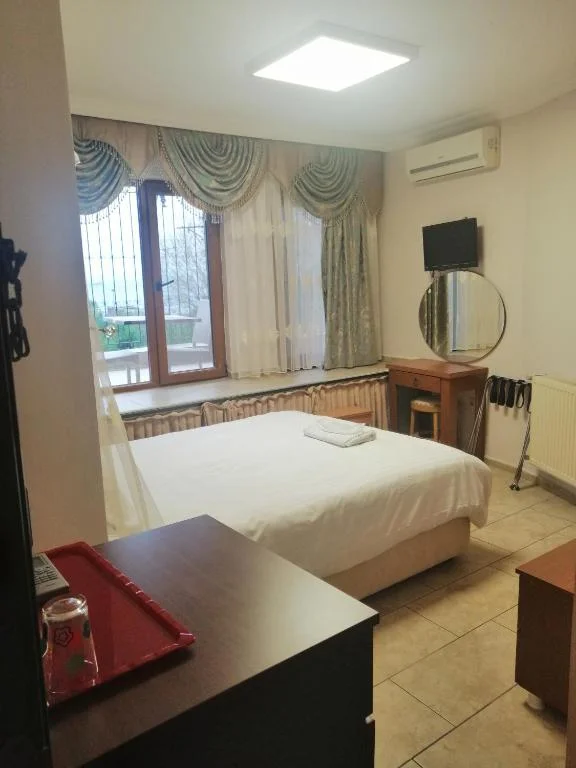 Economy Double Room with Garden View - Basement Floor, Seahouse Suites